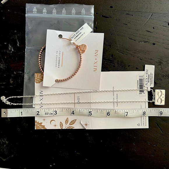 Alex and Ani Family & Infinity Flip Charm
Necklace & Dot Beaded Bracelet - Picture 7 of 9